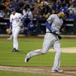 Kansas City Royals' Alcides Escobar reacts after flying out during the fifth inning of Game 4 of the Major League Baseball World Series against the New York Mets Saturday, Oct. 31, 2015, in New York. (AP Photo/David J. Phillip)