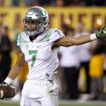 Oregon's Darren Carrington signals a first down after catching a long pass against Arizona State during the first half of an NCAA college football game Thursday, Oct. 29, 2015, in Tempe, Ariz. (AP Photo/Ross D. Franklin)