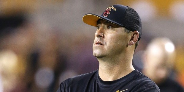 Southern California coach Steve Sarkisian watches his team warm up prior to an NCAA college footbal...