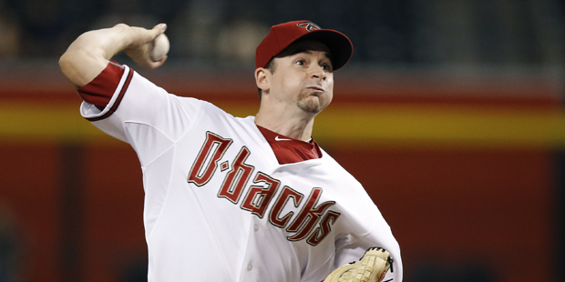Arizona Diamondbacks' Allen Webster throws a pitch during the second inning of a baseball game agai...