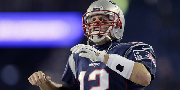 New England Patriots quarterback Tom Brady gets pumped up before an NFL football game against the B...
