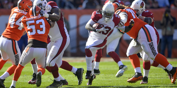 Arizona Cardinals running back Chris Johnson (23) runs for four yards in the first half of an NFL f...
