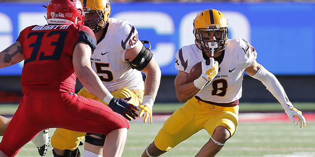 Arizona State running back D.J. Foster (8) runs for a first down during the second half of an NCAA ...