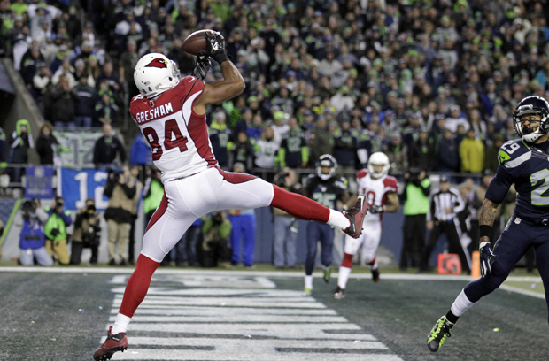 Arizona Cardinals tight end Jermaine Gresham makes a catch for a touchdown against the Seattle Seahawks during the second half of an NFL football game, Sunday, Nov. 15, 2015, in Seattle. (AP Photo/Stephen Brashear)