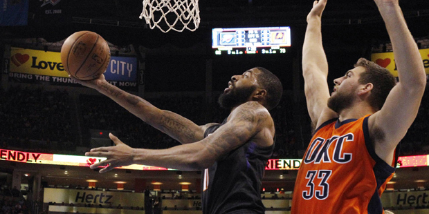 Phoenix Suns forward Markieff Morris (11) shoots in front of Oklahoma City Thunder forward Mitch Mc...