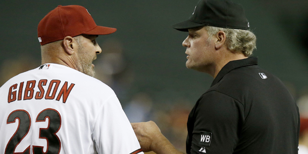 Arizona Diamondbacks' Kirk Gibson (23) is ejected from the game by umpire Ted Barrett after a Gibso...