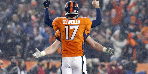 Denver Broncos quarterback Brock Osweiler (17) celebrates the game winning touchdown during overtim...