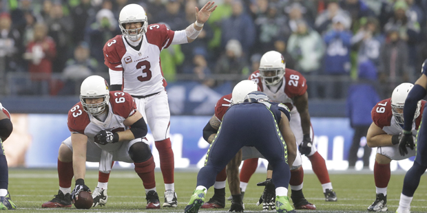 Arizona Cardinals quarterback Carson Palmer (3) calls out from the line of scrimmage against the Se...