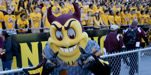 Arizona State mascot "Sparky" points during the first half of an NCAA college football game against...