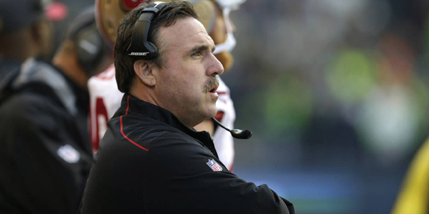 San Francisco 49ers coach Jim Tomsula watches from the sideline during the second half of an NFL fo...