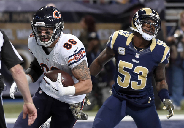 Chicago Bears tight end Zach Miller, left, catches a 2-yard pass for a touchdown as St. Louis Rams linebacker Daren Bates defends during the second quarter of an NFL football game Sunday, Nov. 15, 2015, in St. Louis. (AP Photo/L.G. Patterson)