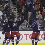 Columbus Blue Jackets' William Karlsson, center, of Sweden, celebrates his goal against the Arizona Coyotes with teammates Kevin Connauton, left, and Cam Atkinson during the third period of an NHL hockey game Saturday, Nov. 14, 2015, in Columbus, Ohio. The Blue Jackets beat the Coyotes 5-2. (AP Photo/Jay LaPrete)