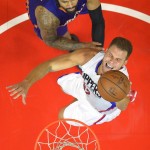 Los Angeles Clippers forward Blake Griffin, below, shoots as Phoenix Suns center Tyson Chandler defends during the first half of an NBA basketball game, Monday, Nov. 2, 2015, in Los Angeles. (AP Photo/Mark J. Terrill)