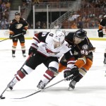 Arizona Coyotes' Mikkel Boedker,left,  of Denmark, is defended by Anaheim Ducks' Jakob Silfverberg, of Sweden, during the first period of an NHL hockey game, Monday, Nov. 9, 2015, in Anaheim, Calif. (AP Photo/Jae C. Hong)