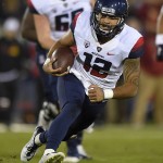 Arizona quarterback Anu Solomon carries the ball during the first half of an NCAA college football game against Southern California, Saturday, Nov. 7, 2015, in Los Angeles. (AP Photo/Mark J. Terrill)