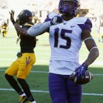 Washington's Darrell Daniels (15) celebrates his touchdown catch after beating Arizona State's Lloyd Carrington (8) for the score during the first half of an NCAA college football game Saturday, Nov. 14, 2015, in Tempe, Ariz. (AP Photo/Ross D. Franklin)