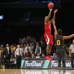 Arizona State players and coaches watch, left, as North Carolina State guard Anthony Barber (12) tries to shoot a 3-pointer in the final seconds in the second half of an NCAA college basketball game in the Legends Classic semifinal Monday, Nov. 23, 2015, in New York. Barber missed his shot and Arizona State defeated North Carolina State 79-76. (AP Photo/Kathy Willens)