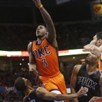 Oklahoma City Thunder guard Dion Waiters (3) is fouled by Phoenix Suns guard Ronnie Price (14) as he shoots in the third quarter of an NBA basketball game in Oklahoma City, Sunday, Nov. 8, 2015. Oklahoma City won 124-103. (AP Photo/Sue Ogrocki)