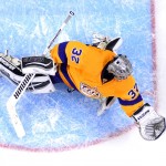 Los Angeles Kings goalie Jonathan Quick makes a glove save during the second period of an NHL hockey game against the Arizona Coyotes, Tuesday, Nov. 10, 2015, in Los Angeles. (AP Photo/Mark J. Terrill)