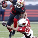 San Francisco 49ers wide receiver Anquan Boldin (81) tries to break a tackle by Arizona Cardinals free safety Tyrann Mathieu (32) during the first half of an NFL football game in Santa Clara, Calif., Sunday, Nov. 29, 2015. (AP Photo/Tony Avelar)