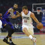 Los Angeles Clippers forward Blake Griffin, right, dribbles past Phoenix Suns forward Markieff Morris during the first half of an NBA basketball game, Monday, Nov. 2, 2015, in Los Angeles. (AP Photo/Mark J. Terrill)