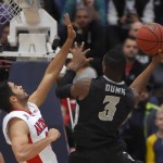 Providence guard Kris Dunn, right, shoots as Arizona guard Elliott Pitts defends during the first half of an NCAA college basketball game at the Wooden Legacy tournament, Friday, Nov. 27, 2015, in Fullerton, Calif. (AP Photo/Mark J. Terrill)