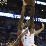 Phoenix Suns guard Eric Bledsoe (2) makes a layup against New Orleans Pelicans guard Ish Smith in the first half of an NBA basketball game in New Orleans, Sunday, Nov. 22, 2015. (AP Photo/Max Becherer)