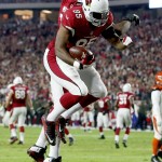 Arizona Cardinals tight end Darren Fells (85) celebrates his touchdown with Bobby Massie (70) during the first half of an NFL  football game against the Cincinnati Bengals, Sunday, Nov. 22, 2015, in Glendale, Ariz. (AP Photo/Ross D. Franklin)