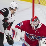Arizona Coyotes' Martin Hanzal (11) moves in on Montreal Canadiens goaltender Mike Condon during the third period of an NHL hockey game in Montreal, Thursday, Nov. 19, 2015. (Graham Hughes/The Canadian Press via AP) MANDATORY CREDIT