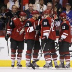 Arizona Coyotes' Oliver Ekman-Larsson, of Sweden, celebrates his goal against the Edmonton Oilers with teammates Jordan Martinook, left, Shane Doan (19), Michael Stone (26) and Brad Richardson (12) during the first period of an NHL hockey game Thursday, Nov. 12, 2015, in Glendale, Ariz. (AP Photo/Ross D. Franklin)