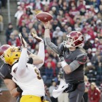 Washington State quarterback Luke Falk (4) passes during the first half of an NCAA college football game against Arizona State, Saturday, Nov. 7, 2015, in Pullman, Wash. (AP Photo/Young Kwak)