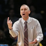 Arizona State head coach Bobby Hurley gestures in the first half of a Legends Classic semifinal against North Carolina State in an NCAA college basketball game Monday, Nov. 23, 2015, in New York.  (AP Photo/Kathy Willens)
