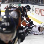 Arizona Coyotes' Michael Stone, right, is pinned by Anaheim Ducks' Ryan Kesler during the second period of an NHL hockey game, Monday, Nov. 9, 2015, in Anaheim, Calif. (AP Photo/Jae C. Hong)