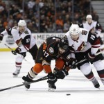 Arizona Coyotes' Shane Doan, right, and Anaheim Ducks' Ryan Kesler fight for the puck during the third period of an NHL hockey game, Monday, Nov. 9, 2015, in Anaheim, Calif. The Coyotes won 4-3 in overtime. (AP Photo/Jae C. Hong)