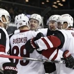 Arizona Coyotes' Mikkel Boedker (89) celebrates with teammates after scoring a gaol during the third period of an NHL hockey game against the New York Islanders Monday, Nov. 16, 2015, in New York. The Islanders won the game 5-2. (AP Photo/Frank Franklin II)