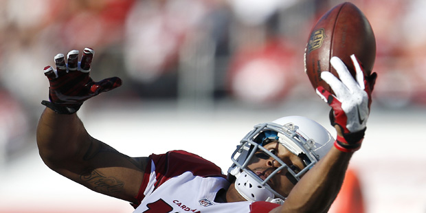 Arizona Cardinals wide receiver Michael Floyd (15) catches a pass against the San Francisco 49ers d...