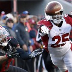 San Francisco 49ers wide receiver Quinton Patton (11) cannot catch a pass in front of Arizona Cardinals cornerback Jerraud Powers (25) during the first half of an NFL football game in Santa Clara, Calif., Sunday, Nov. 29, 2015. (AP Photo/Tony Avelar)