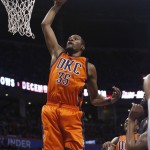 Oklahoma City Thunder forward Kevin Durant (35) goes up for a dunk in the third quarter of an NBA basketball game against the Phoenix Suns in Oklahoma City, Sunday, Nov. 8, 2015. Oklahoma City won 124-103. (AP Photo/Sue Ogrocki)