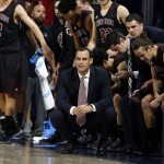 Chico State head coach Greg Clink watches game action against the Arizona during the first half of an NCAA college basketball exhibition game, Sunday, Nov 8, 2015, in Tucson, Ariz. (AP Photo/Rick Scuteri)