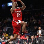 North Carolina State Anthony "Cat" Barber (12) goes up for a layup in the second half of an NCAA college basketball game in the Legends Classic semifinal against Arizona State, Monday, Nov. 23, 2015, in New York. Arizona State defeated North Carolina State 79-76. (AP Photo/Kathy Willens)