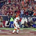 Cincinnati Bengals running back Jeremy Hill (32) celebrates his touchdown against the Arizona Cardinals during the first half of an NFL  football game, Sunday, Nov. 22, 2015, in Glendale, Ariz. (AP Photo/Rick Scuteri)