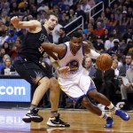 Golden State Warriors guard Leandro Barbosa (19) drives on Phoenix Suns forward Mirza Teletovic during the second quarter of an NBA basketball game, Friday, Nov. 27, 2015, in Phoenix. (AP Photo/Rick Scuteri)
