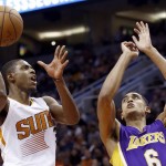 Phoenix Suns' Brandon Knight, left, shoots over Los Angeles Lakers' Jordan Clarkson (6) during the second half of an NBA basketball game, Monday, Nov. 16, 2015, in Phoenix. The Suns defeated the Lakers 120-101. (AP Photo/Ross D. Franklin)