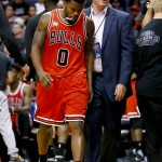 Chicago Bulls guard Aaron Brooks (0) leaves the game after being injured during the second half of an NBA basketball game against the Phoenix Suns, Wednesday, Nov. 18, 2015, in Phoenix. The Bulls won 103-97. (AP Photo/Matt York)
