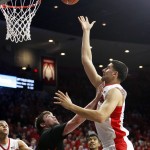 Arizona center Dusan Ristic, right, shoots over Boise State forward Nick Duncan during the second half of an NCAA college basketball game, Thursday, Nov. 19, 2015, in Tucson, Ariz. (AP Photo/Rick Scuteri)