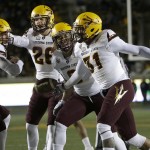 Arizona State's Marcus Ball (31) celebrates with teammates after recovering a fumble by California's Kanawai Noa on a punt during the first half of an NCAA college football game in Berkeley, Calif., Saturday, Nov. 28, 2015. (AP Photo/Jeff Chiu)