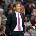 Phoenix Suns coach Jeff Hornacek smiles after a foul call during the second half of an NBA basketball game against the Denver Nuggets, Saturday, Nov. 14, 2015, in Phoenix. (AP Photo/Ralph Freso)