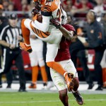 Cincinnati Bengals strong safety Leon Hall (29) intercepts a pass intended for Arizona Cardinals wide receiver Larry Fitzgerald (11) during the first half of an NFL  football game, Sunday, Nov. 22, 2015, in Glendale, Ariz. (AP Photo/Rick Scuteri)