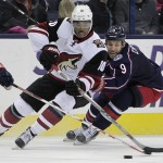 Arizona Coyotes' Anthony Duclair, left, carries the puck as Columbus Blue Jackets' Gregory Campbell defends during the third period of an NHL hockey game, Saturday, Nov. 14, 2015, in Columbus, Ohio. The Blue Jackets defeated the Coyotes 5-2. (AP Photo/Jay LaPrete)