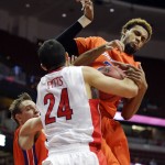 Arizona guard Elliott Pitts (24) fights for a rebound with Boise State forward James Webb III during the second half of an NCAA college basketball game at the Wooden Legacy tournament, Sunday, Nov. 29, 2015, in Anaheim, Calif. (AP Photo/Jae C. Hong)